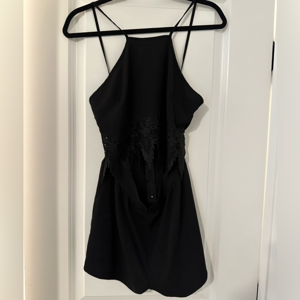 Solemio black romper with cut out